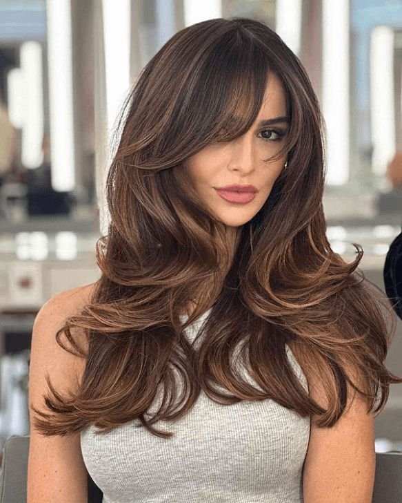 30 Side-Swept Bangs To Soften Your Features
